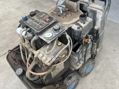 Dirty and worn Edge Panther pressure washer prior to service and repair, showing condition before maintenance work.